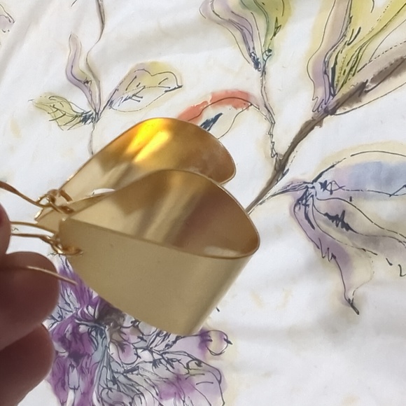 Gorgeous gold light hanging folded triangle earrings.  EUC - Picture 3 of 4